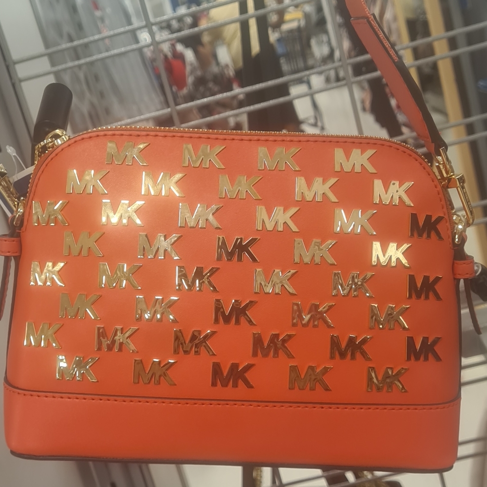 Bolso bandolera MICHAEL KORS Jet Set Dije Grande Este Oeste en naranja